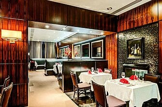 a room with tables and chairs